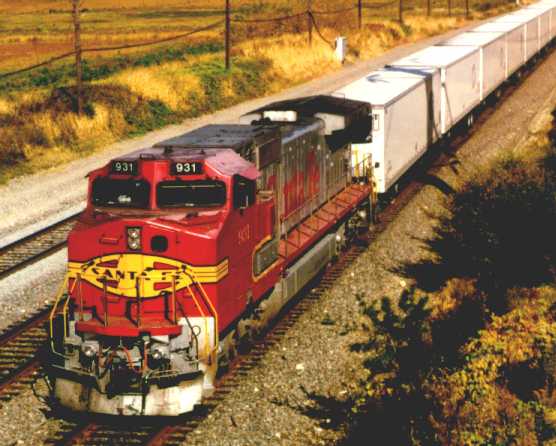 Intermodal BNSF-Mark VII-TemStar train departing Chicago for Los Angeles with new 53' refrigerated trailers